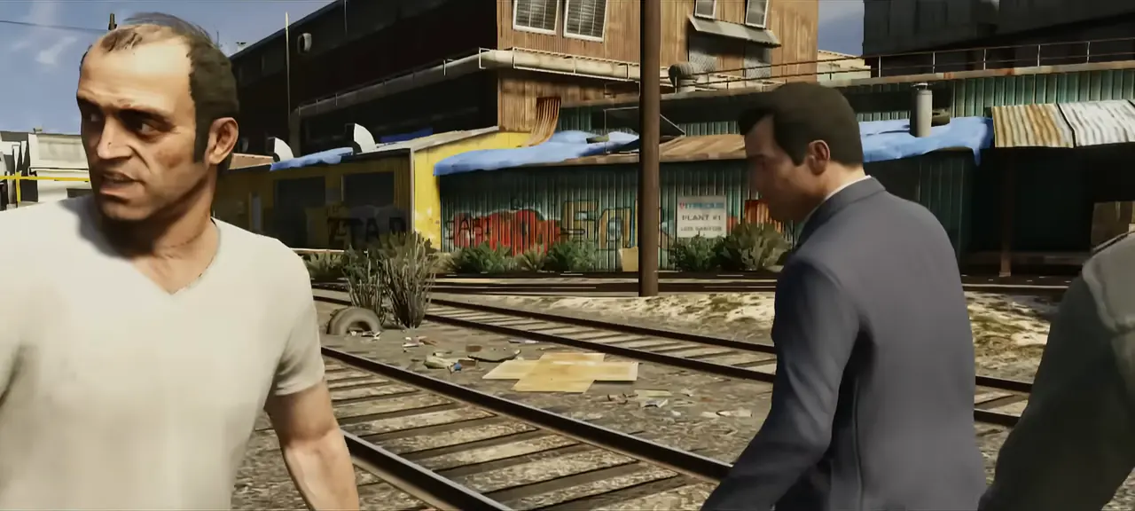 Trevor Philips in a white T-shirt walking along railway tracks with Michael