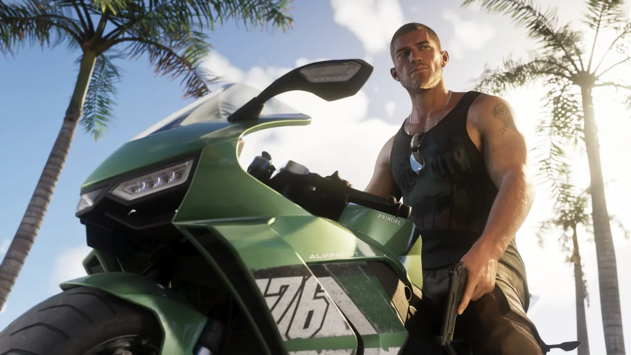 Jason Duval standing beside a green sport bike under palm trees, holding a pistol